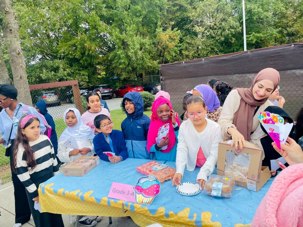 Families at a school bake sale